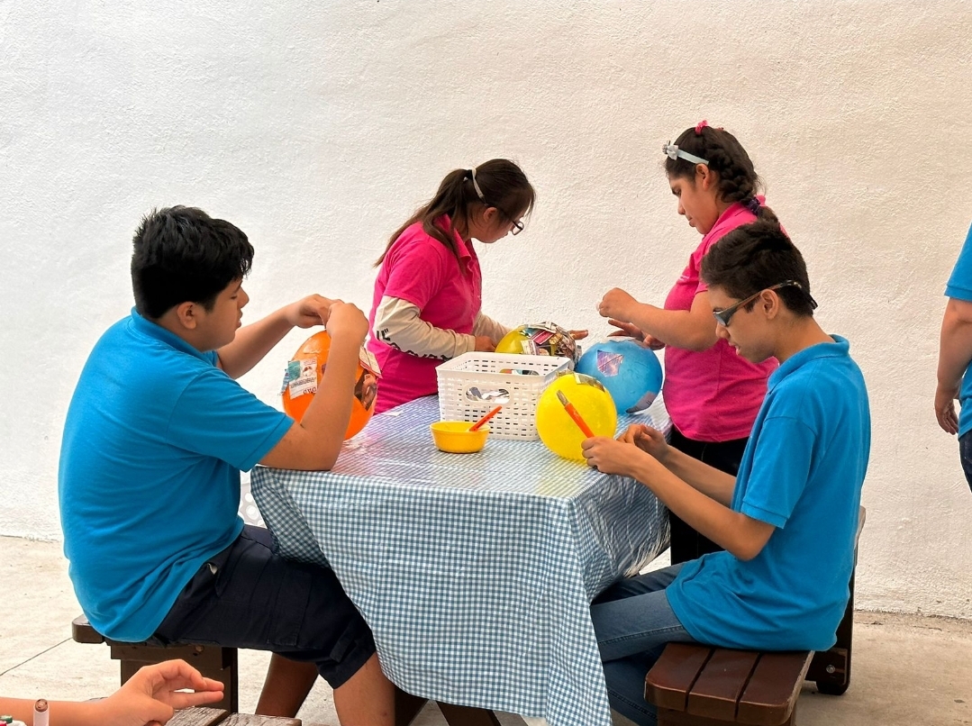 Caliente Ayuda a escuela de integración para niños especiales